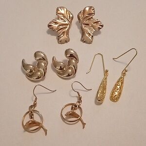 #995.  4 Piece Assorted Dolphin &  Gold Toned Earring Bundle.
